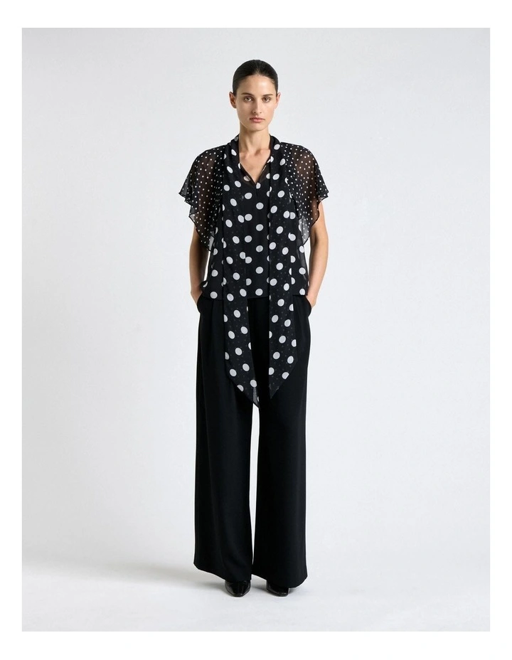 Polka Dot Ruffle Sleeve Tie Neck Blouse in Black image 2