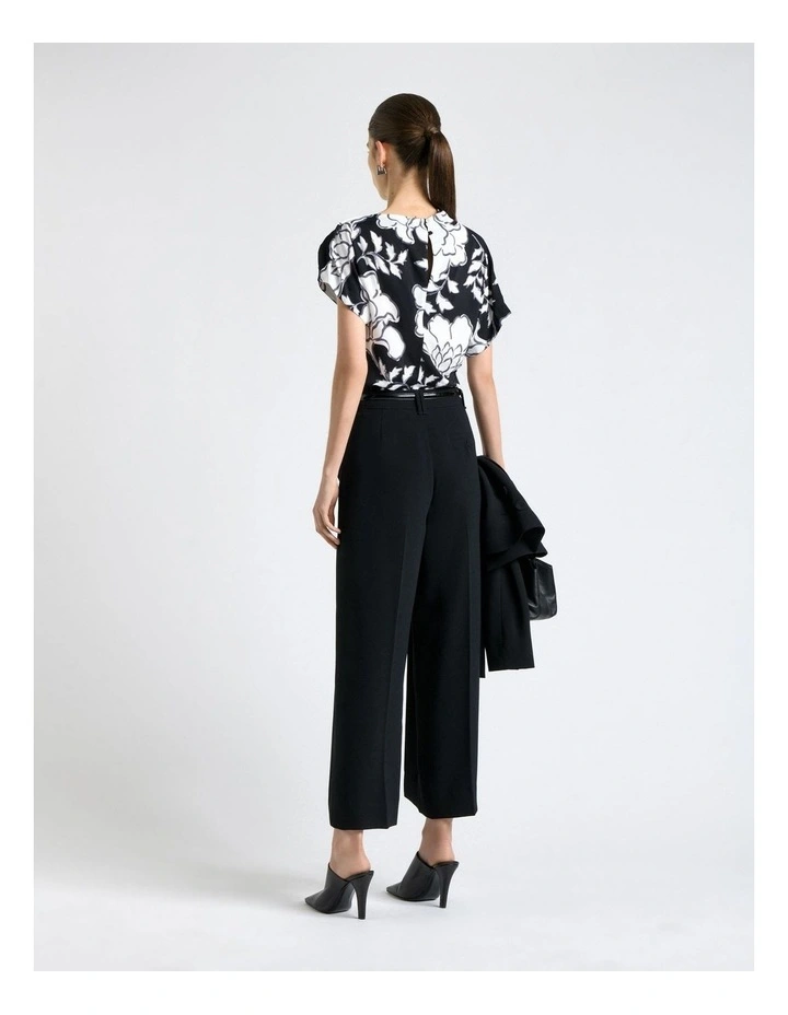 Graphic Floral Fold Neck Top in Black image 2