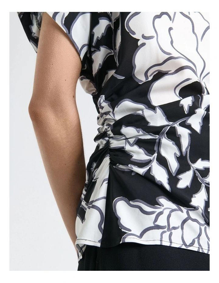 Graphic Floral Fold Neck Top in Black image 4