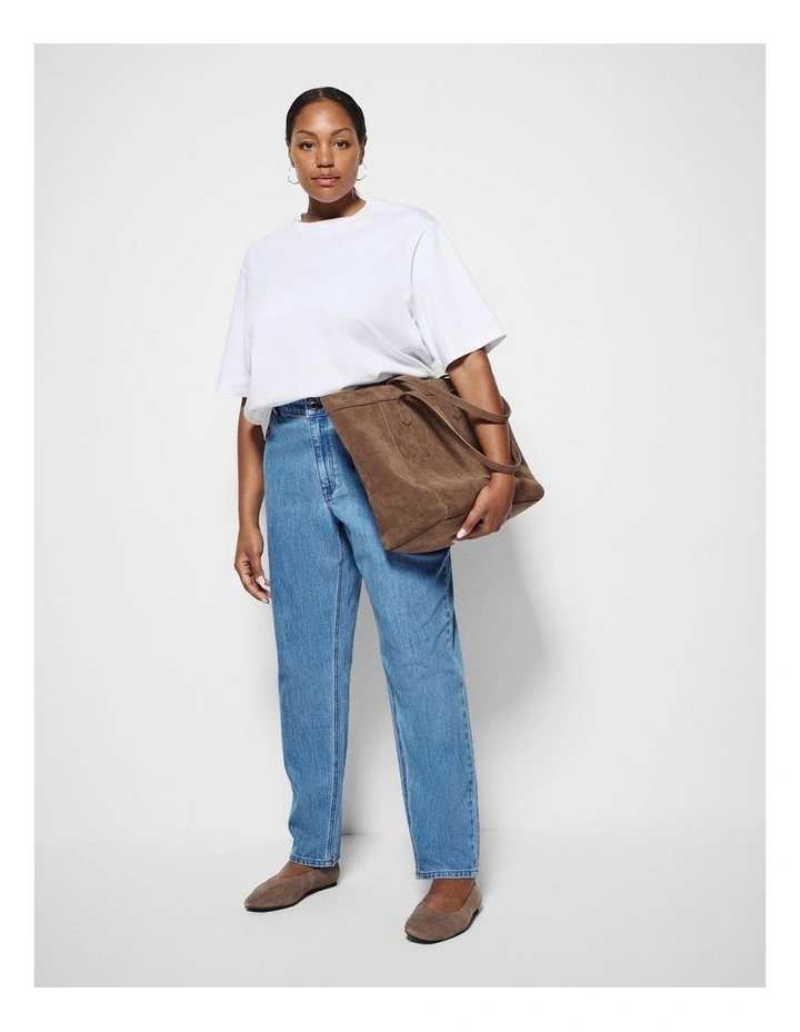 The Mid Rise Slim Jean in Light Blue Wash image 1