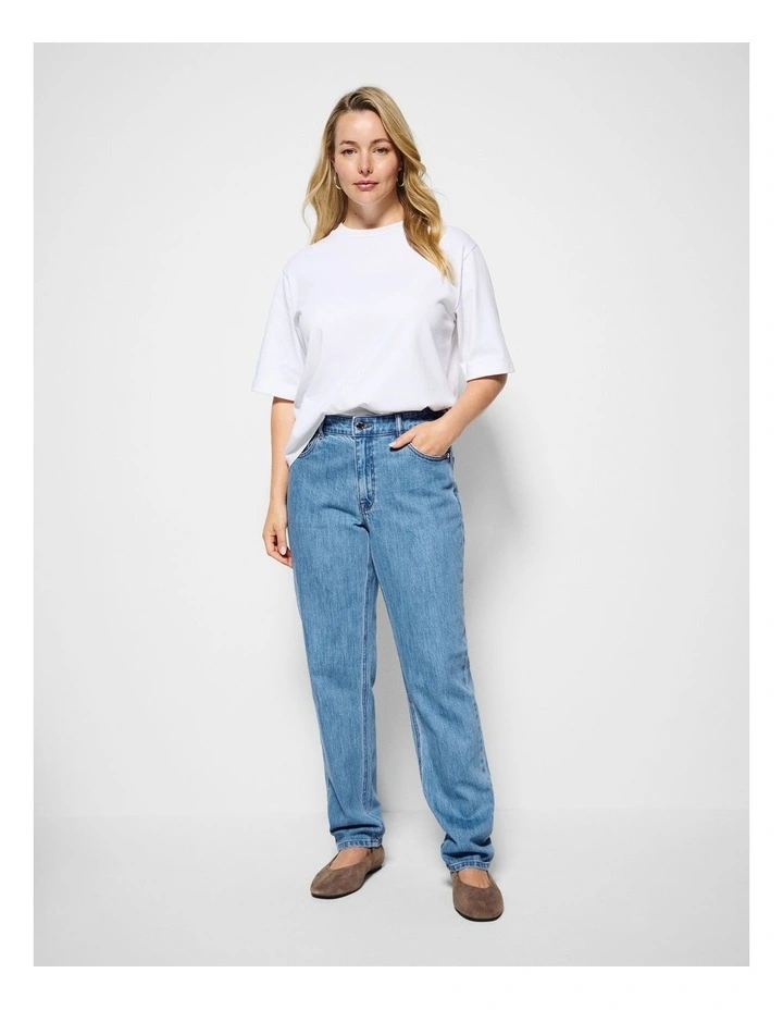 The Mid Rise Slim Jean in Light Blue Wash image 5