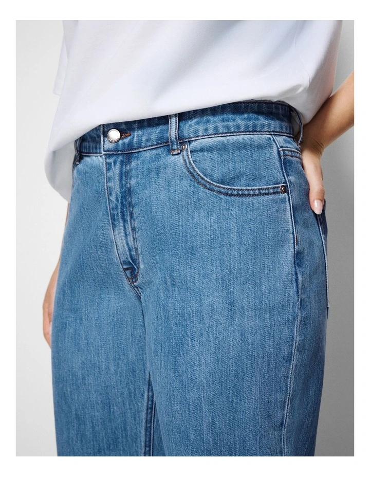 The Mid Rise Slim Jean in Light Blue Wash image 6