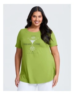 The Lotus HBO Original Welcome Drink Top in Green