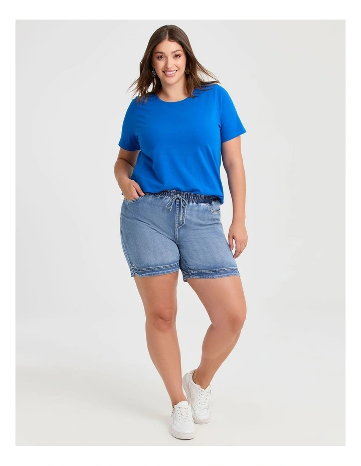 Cotton Curved Hem Denim Shorts in Light Blue Denim image 3