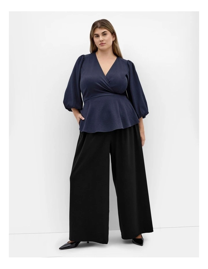 Celina Peplum Top in Navy image 1