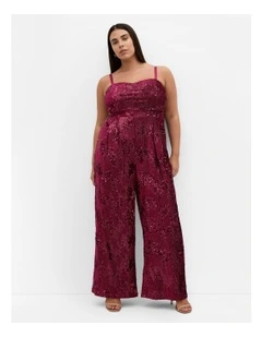 Glimmer Sequin Strapless Jumpsuit in Ruby