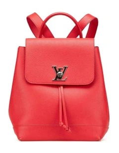 Elegant Leather Backpack with Adjustable Straps and Interior Pockets Pre-Loved