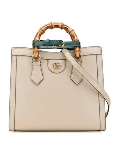 Elegant Top Handle Leather Handbag with Bamboo Accents and Shoulder Strap Pre-Loved