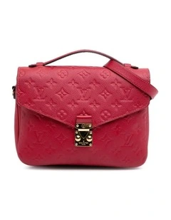 Textured Leather Satchel with Adjustable Strap and Secure Closure Pre-Loved