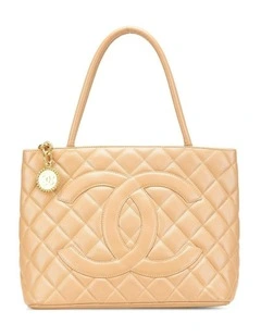 Elegant Quilted Top Handle Bag with Charm Stylish Fashion Accessory Pre-Loved