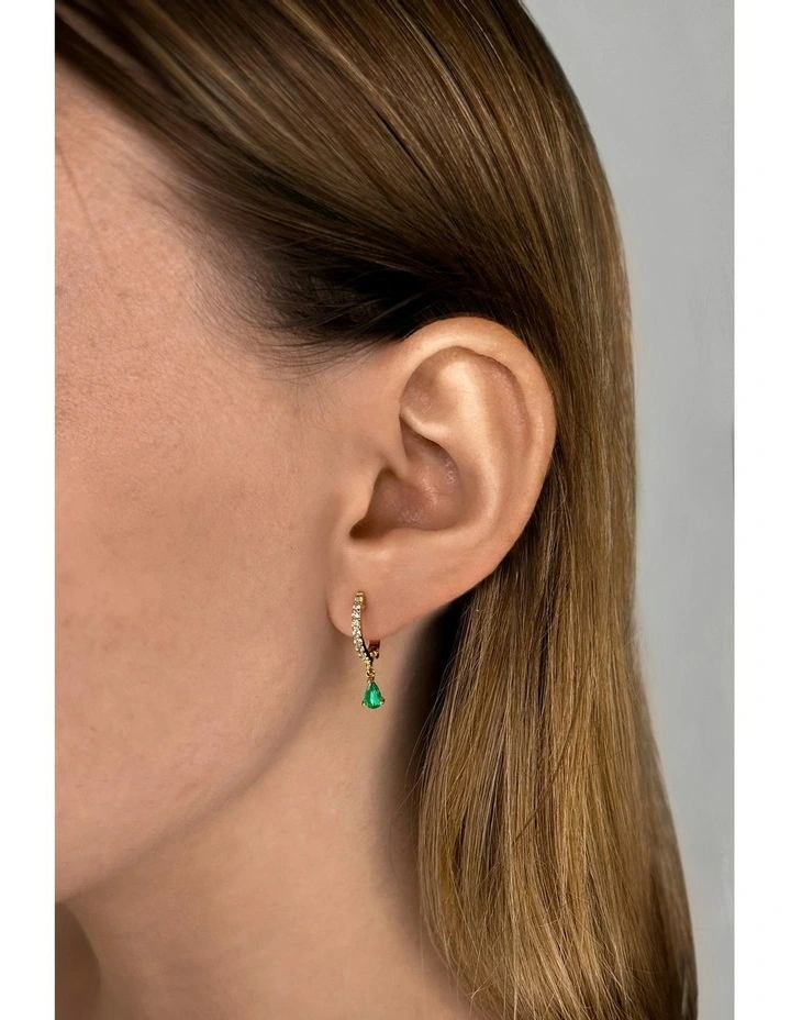 Pure Drop Huggie Earrings in Emeralds image 2