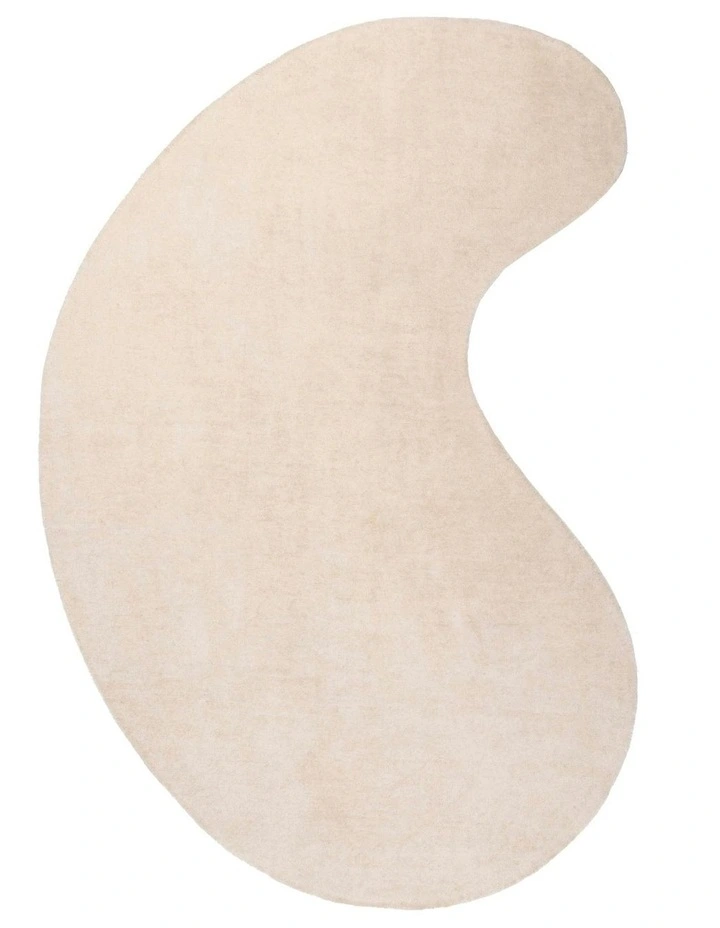 Vanni Solid Curved Wool Rug in Cream image 1