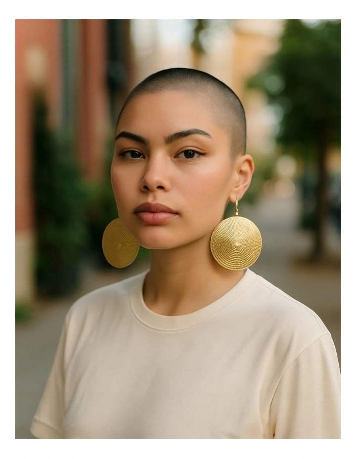 Embossed Metal Disc Dangle Earrings in Gold image 2