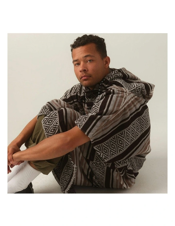 Oso Changing Poncho in Multi image 4