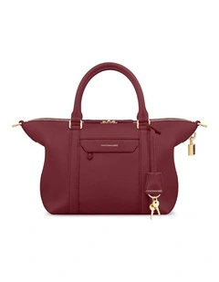 The Small Leather Weekender Bag in Plum Red