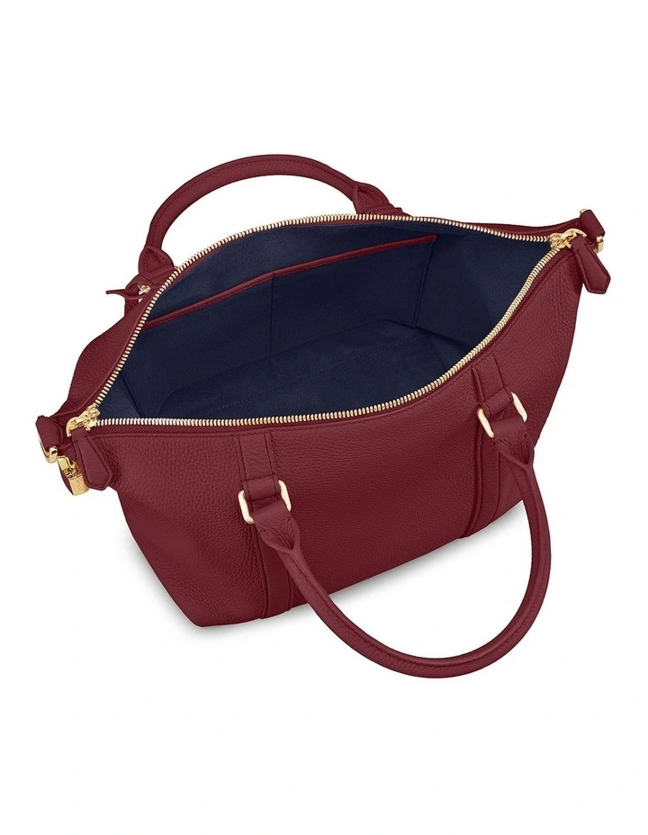 The Small Leather Weekender Bag in Plum Red image 6