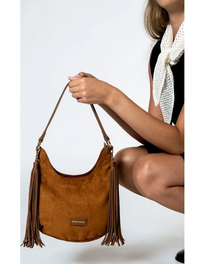 LARGE SCOOP TOP TASSLE BAG IN TAN FAUX SUEDE image 2