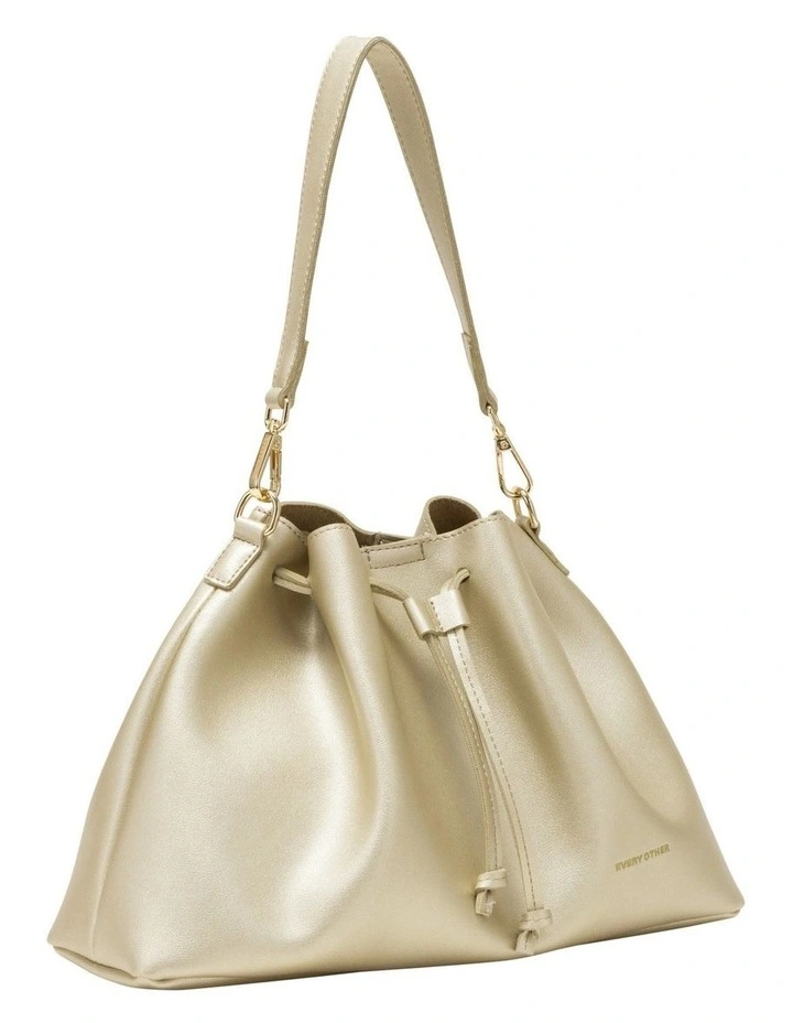 DRAWSTRING SHOULDER CROSS BODY IN GOLD image 1