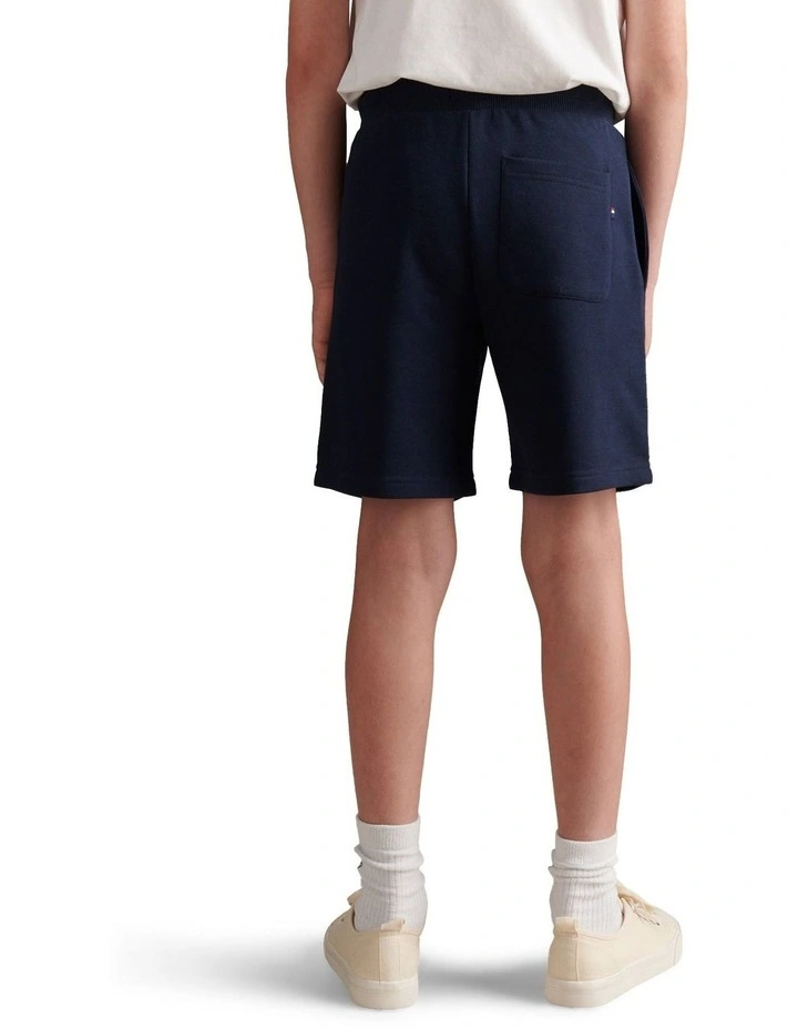 Player 3 Sweat Short in Dark Sapphire Navy / Haute Red DHM image 4