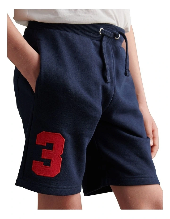 Player 3 Sweat Short in Dark Sapphire Navy / Haute Red DHM image 5