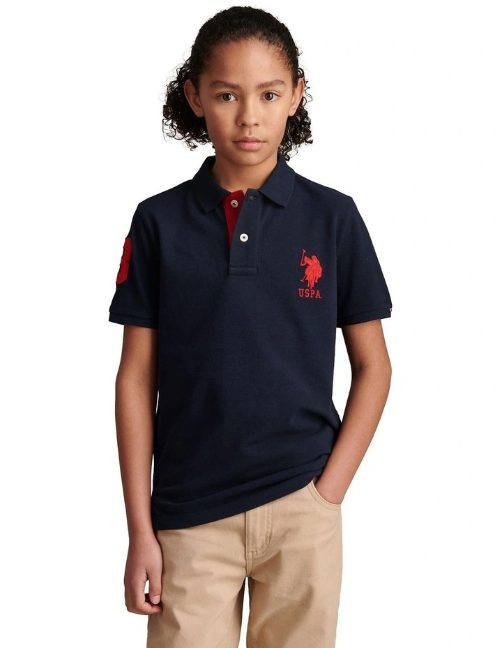 Boys Player 3 Polo Shirt Dark Sapphire Navy / Haute Red DHM image 1