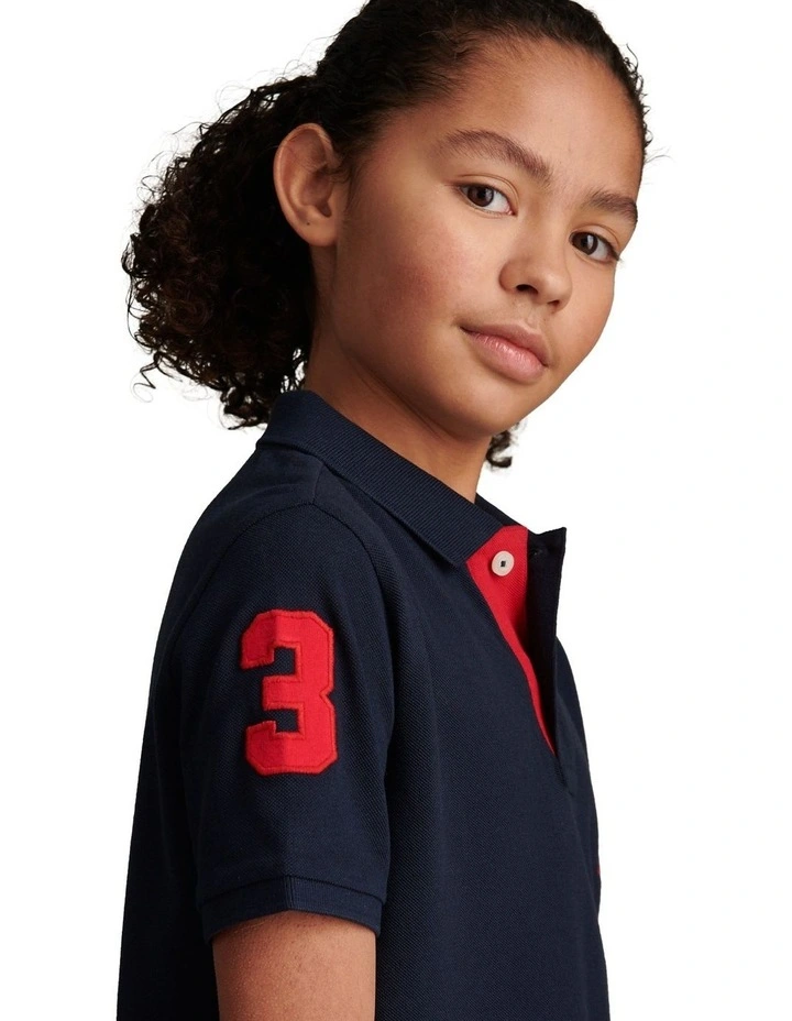 Boys Player 3 Polo Shirt Dark Sapphire Navy / Haute Red DHM image 5