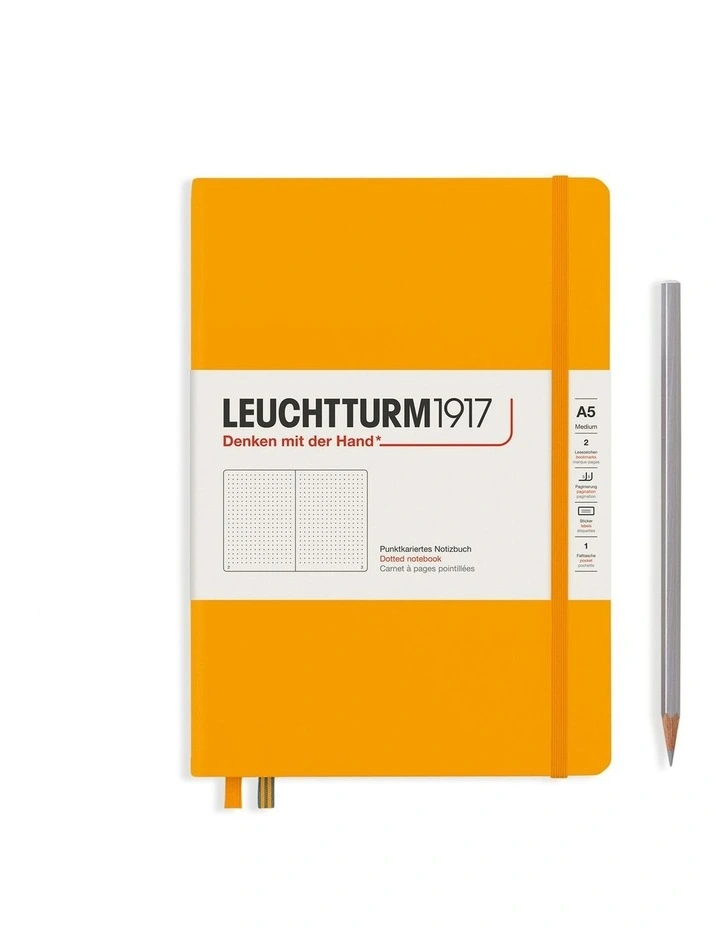 Notebook Medium (A5), Hardcover, 251 numbered pages, Rising Sun, dotted image 1