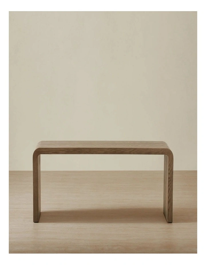 Reeves Medium Brown Ottoman Table image 1