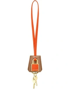 The SABRMOJI Padlock Charm in Manhattan Sandstone