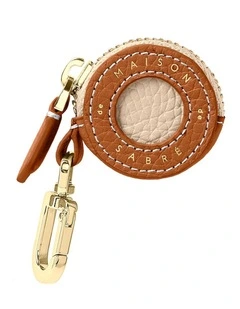 The Airtag Charm in Pecan Nude