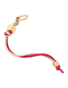 The Wristlet Charm in Saharan Fuchsia